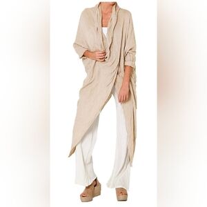 Celmia women’s casual oversized tunic blouse featuring an asymmetrical draped